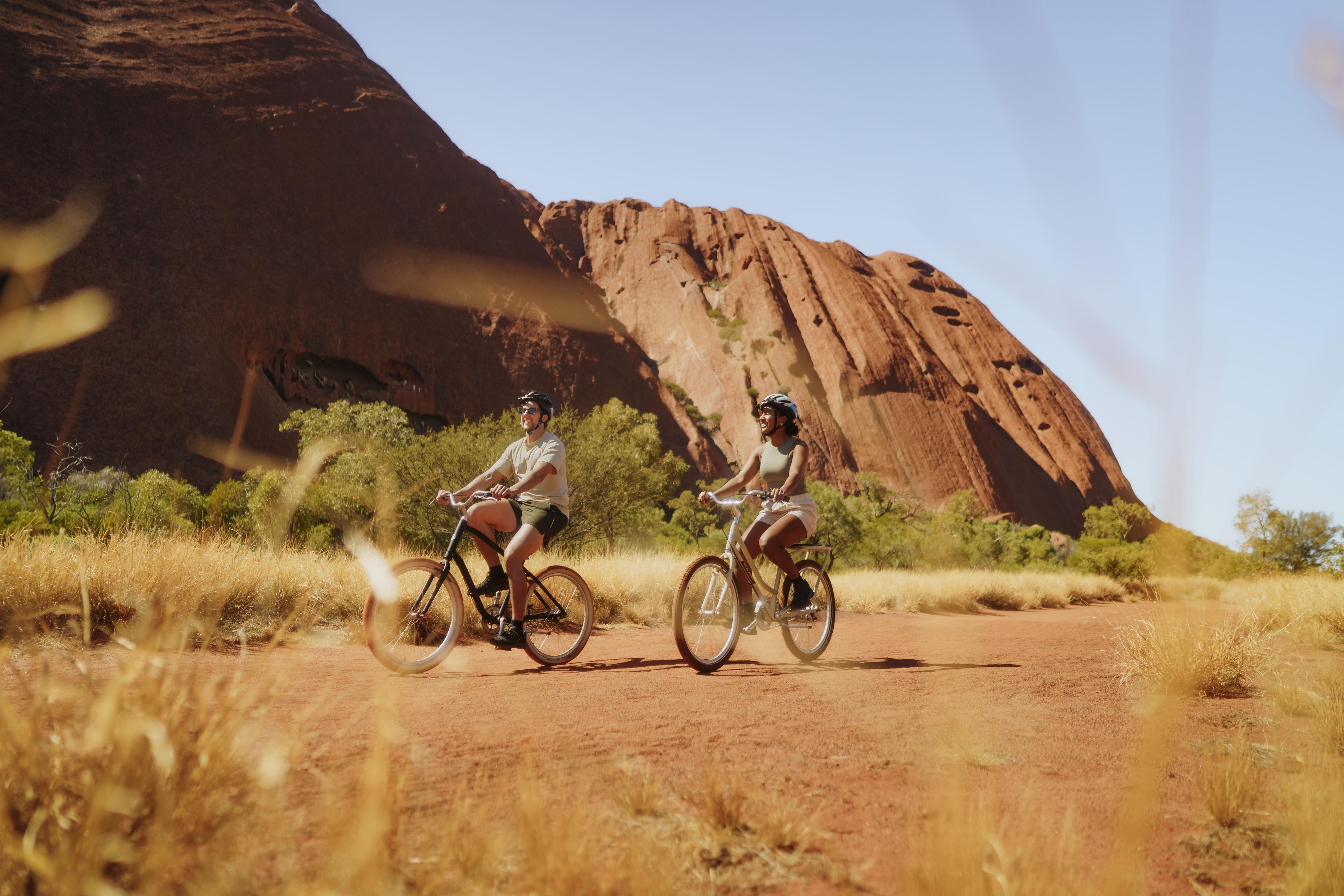 couple biking in the desert