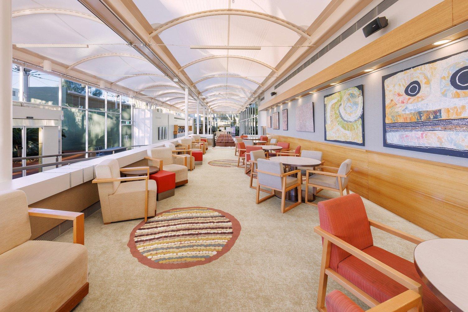 Couches and tables at Walpa Lobby Bar, closest to the reception in Sails in the Desert