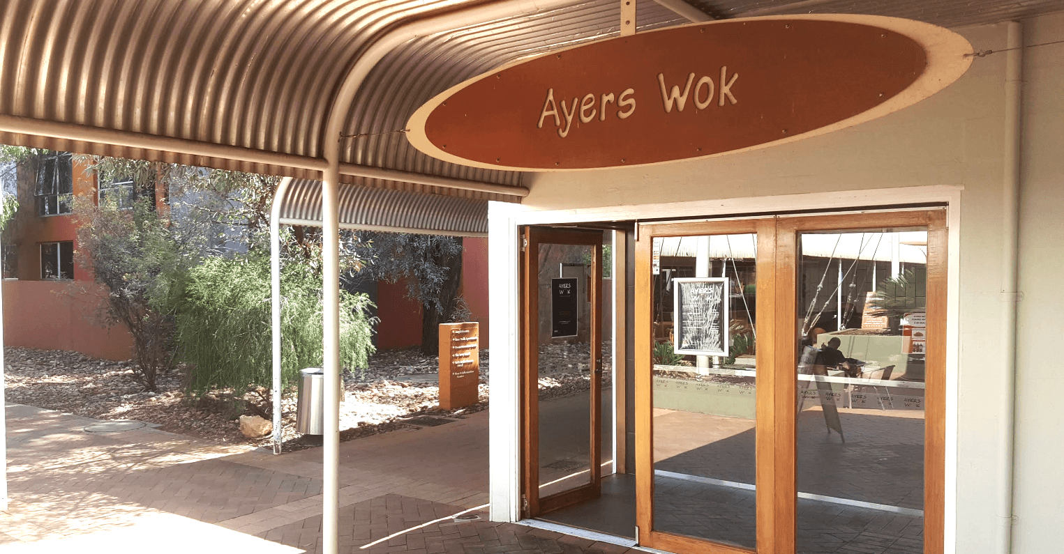 Entrance of Ayers Wok with a large Ayers Wok Sign in Towns Square