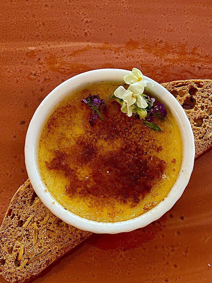 Creme Brulee placed on top of a piece of bread