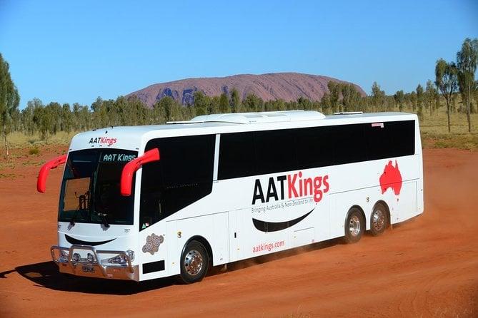 AAT Kings Coach in front of Uluru