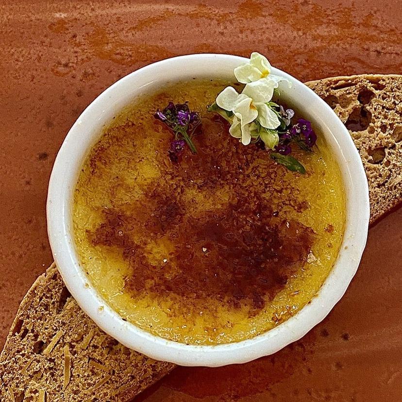 Creme Brulee placed on top of a piece of bread
