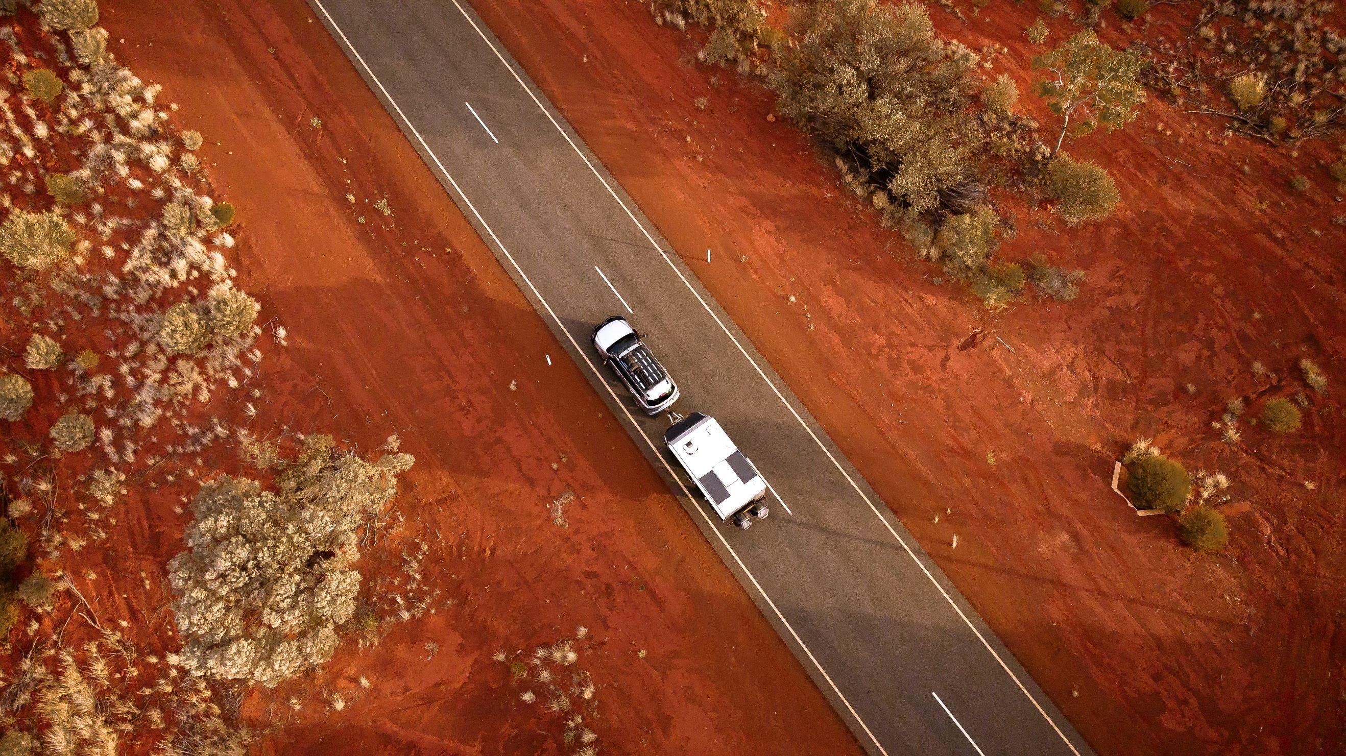 ariel_view_of_caravan_and_car_in_red_centre