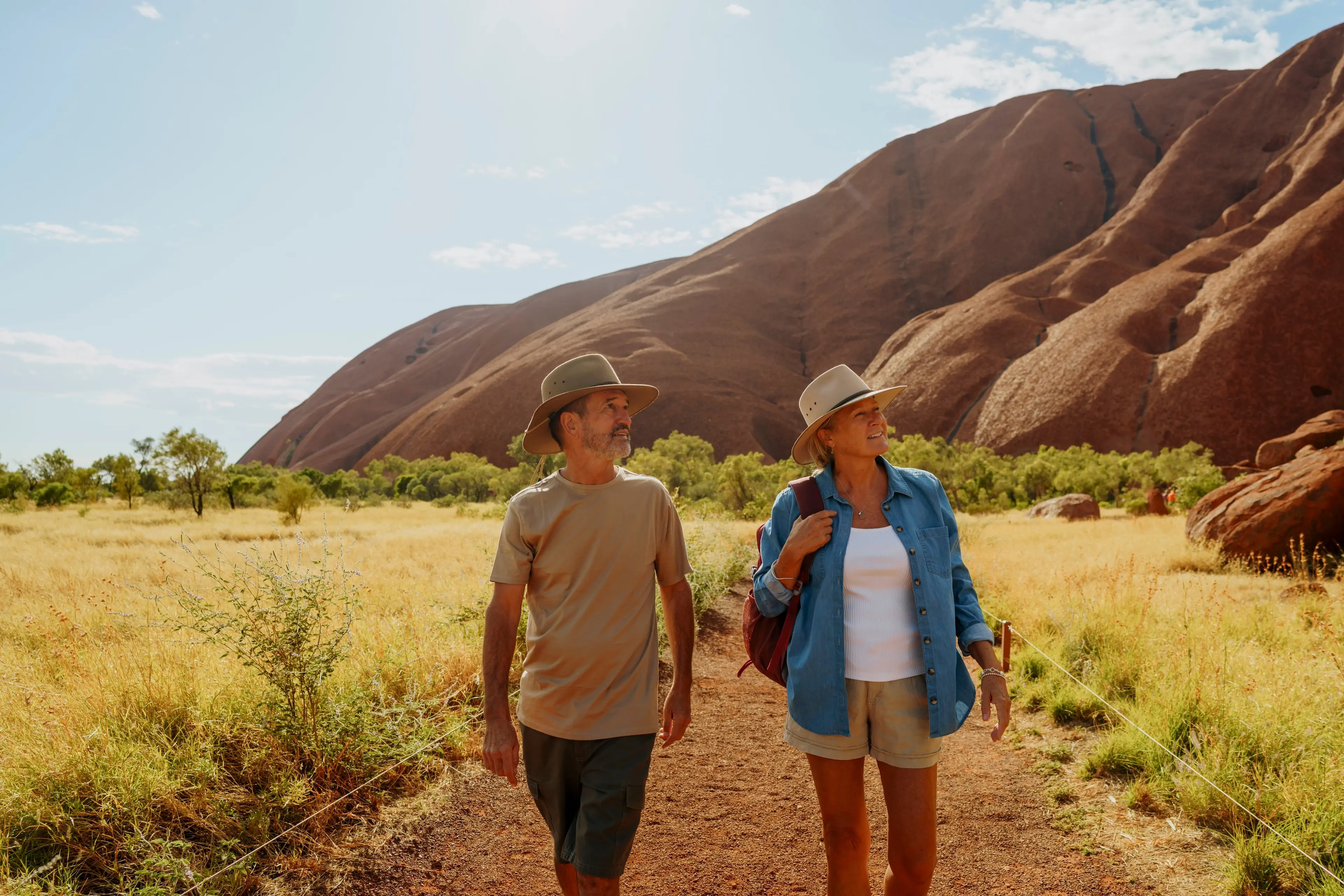 A couple on a morning walk near Uluru