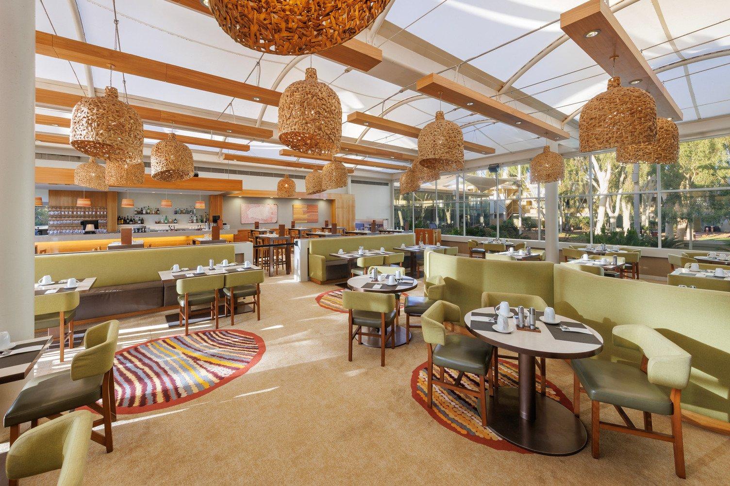 An image of the table and chair set up in Ilkari Restaurant, Sails in the Desert during Buffet Breakfast.