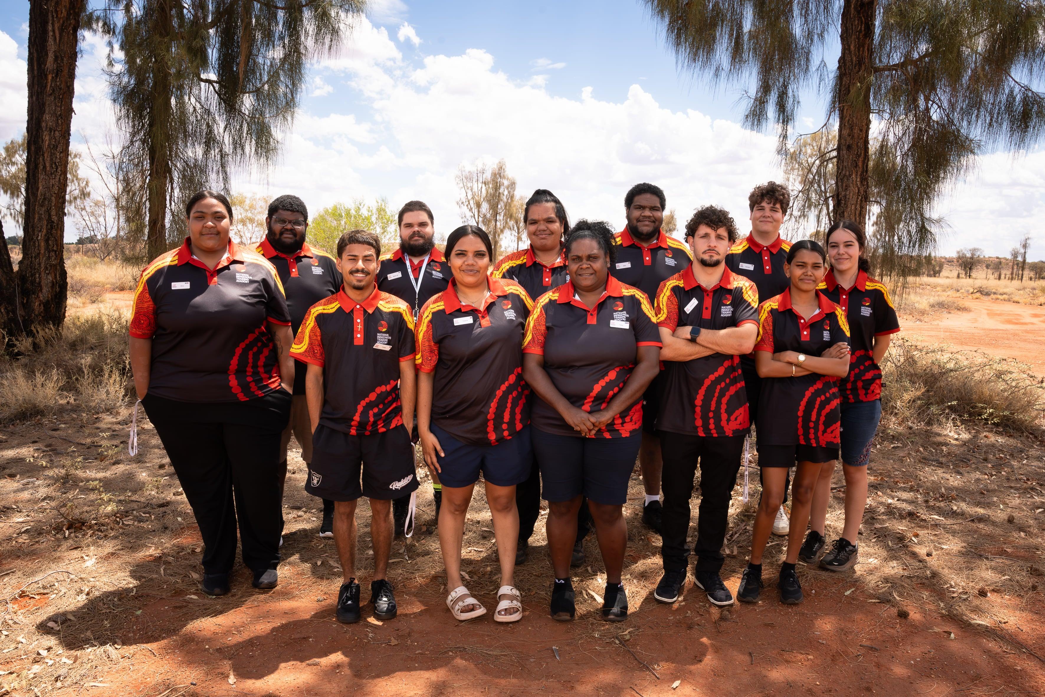 A group of Indigenous trainees graduating from the National Indigenous Training Academy in 2026