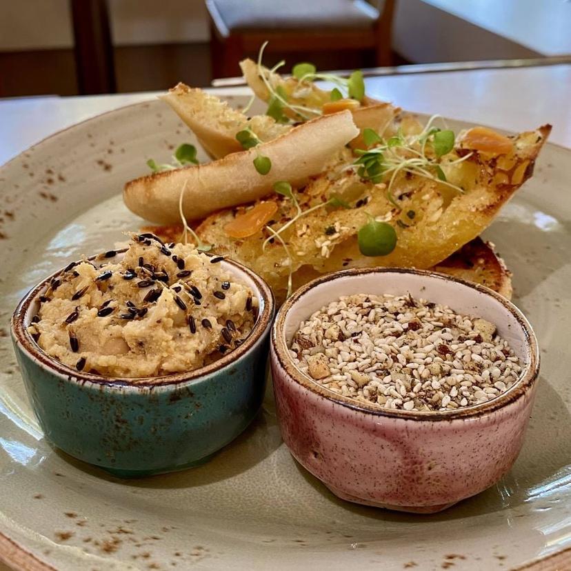 wattleseed hummus and fermented garlic turkish bread