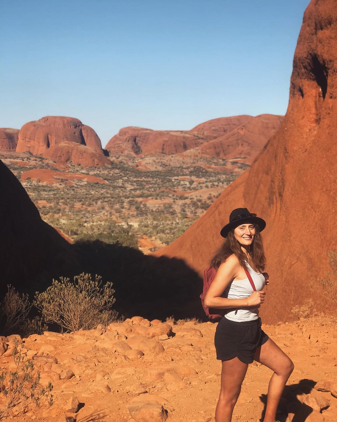 A woman hikes in Australia's Red Centre