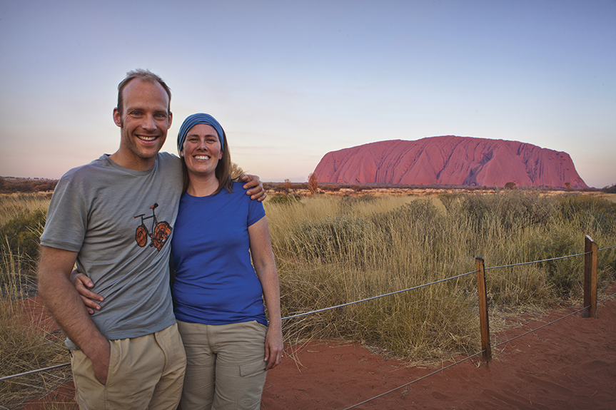 couple in front of Uluru