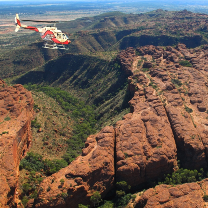 Helicopter flying over outback