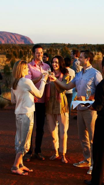  | Uluru Australia | Uluru Rockies | Mossmangor Indigenous TourismA group socializing with champagne outside
