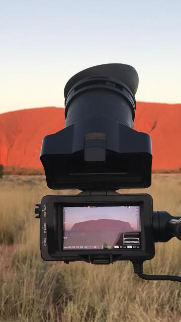 camera in front of Uluru