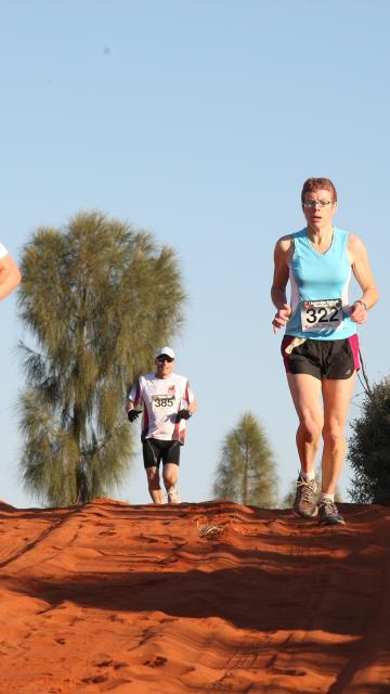Runners compete in the Australian Outback Marathon