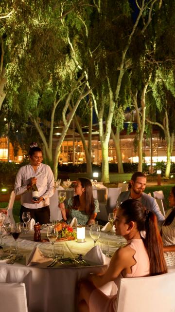 Poolside dining at Sails in the Desert