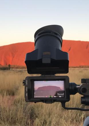 camera in front of Uluru